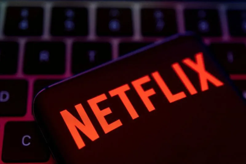Tela com logo da Netflix e gráfico de ações