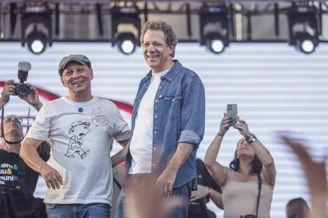 Fernando Haddad e Simone Tebet em ato do Dia do Trabalhador