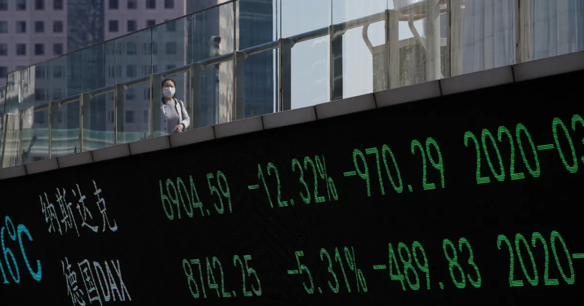 Painel eletrônicade cotações em pregão asiático