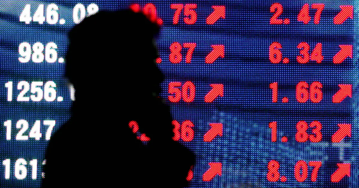 Painel de cotações em bolsa na Ásia