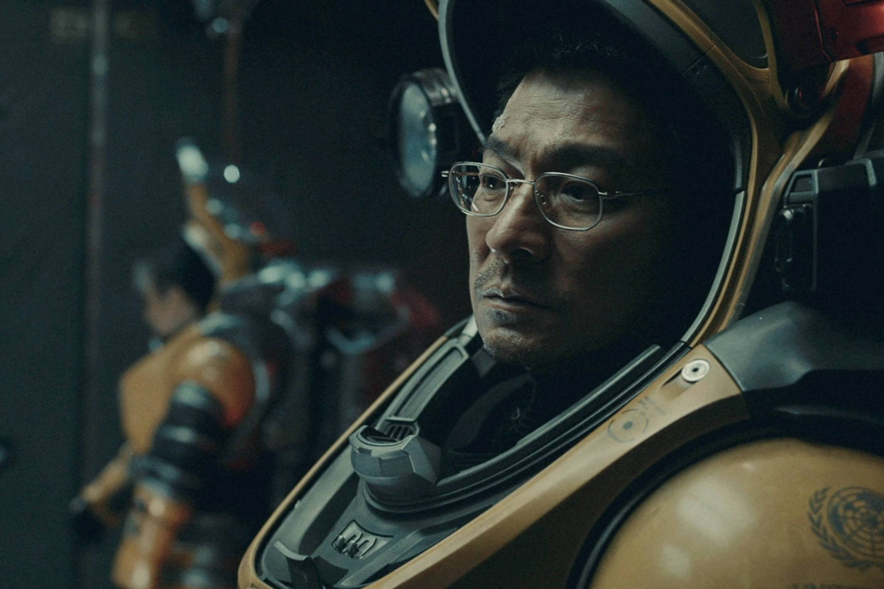 Cartaz do filme Terra à Deriva 2 com astronautas e estrutura espacial