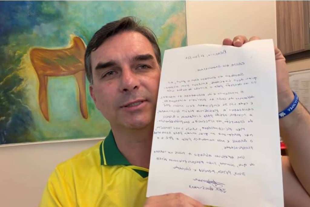 Ministro Alexandre de Moraes e o senador Flávio Bolsonaro