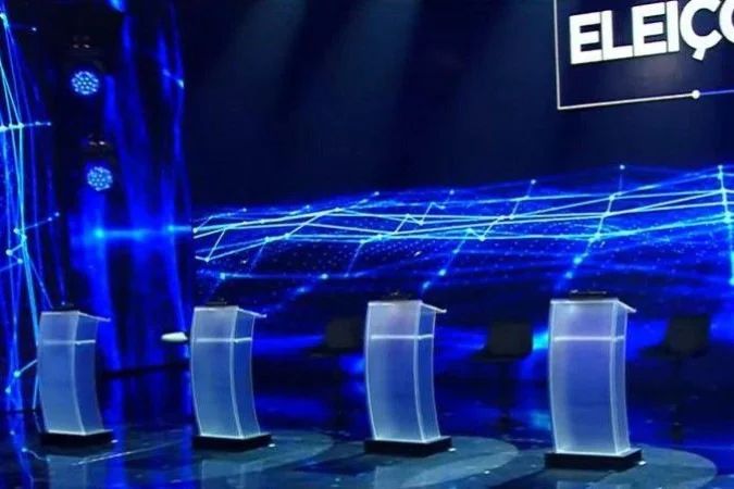 Candidatos durante debate presidencial