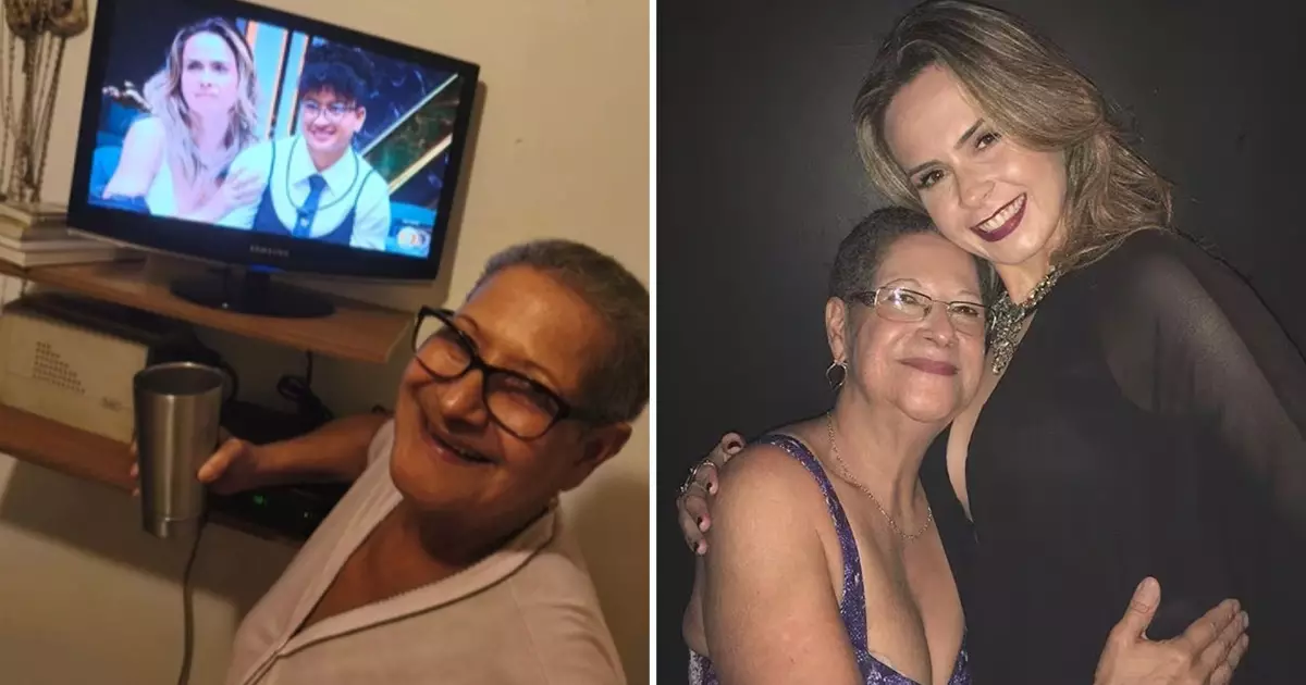 Dona Geralda assistindo à final do BBB26 em frente à TV
