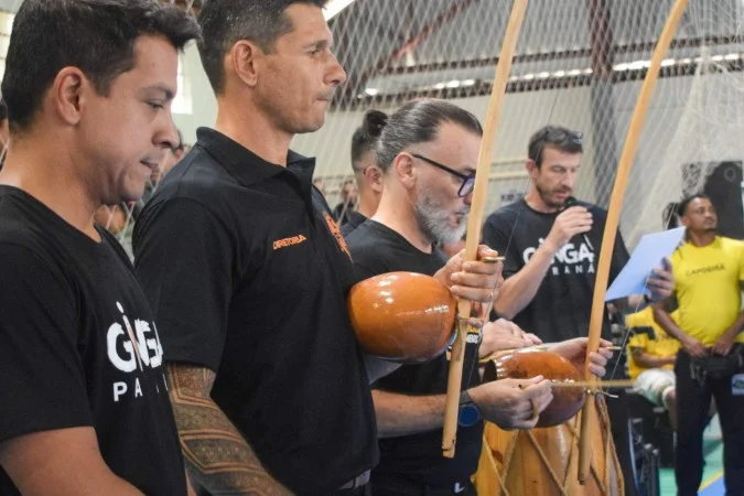 Atletas de capoeira em competição do VMB