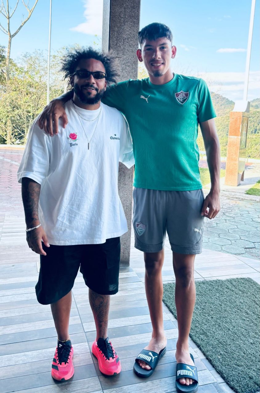 Carlos Areco com Marcelo em Xerém