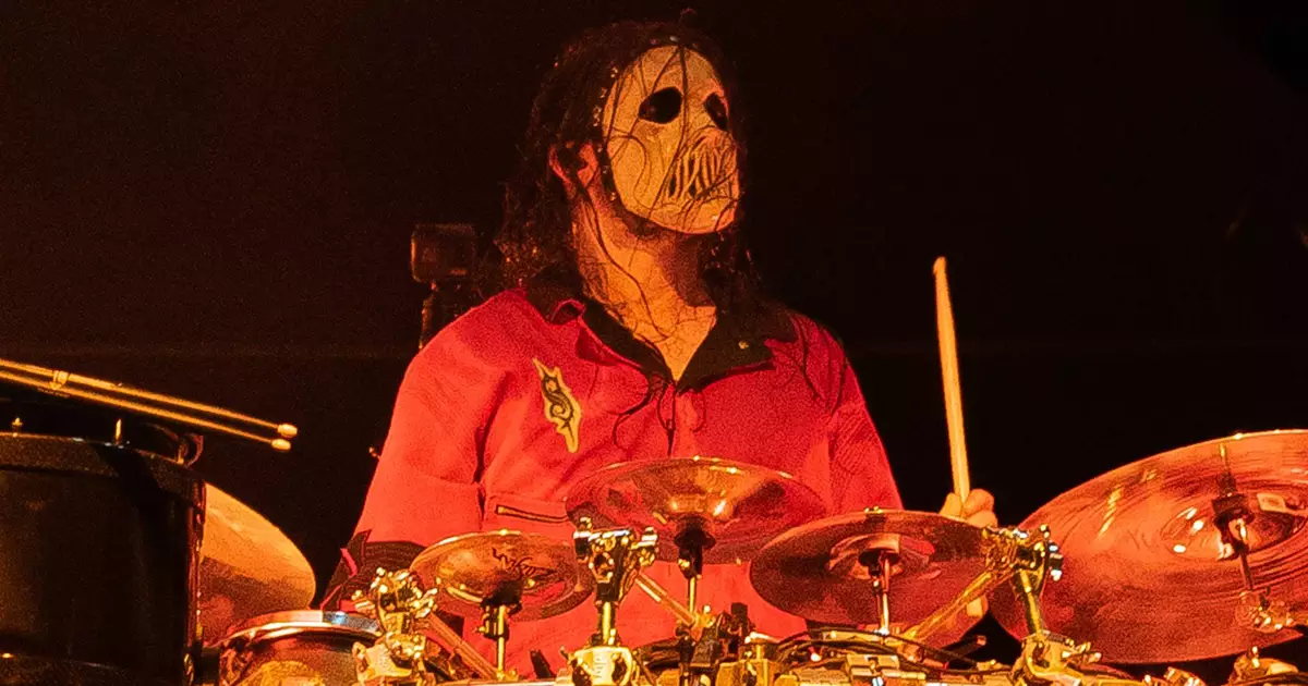 Jay Weinberg com baquetas