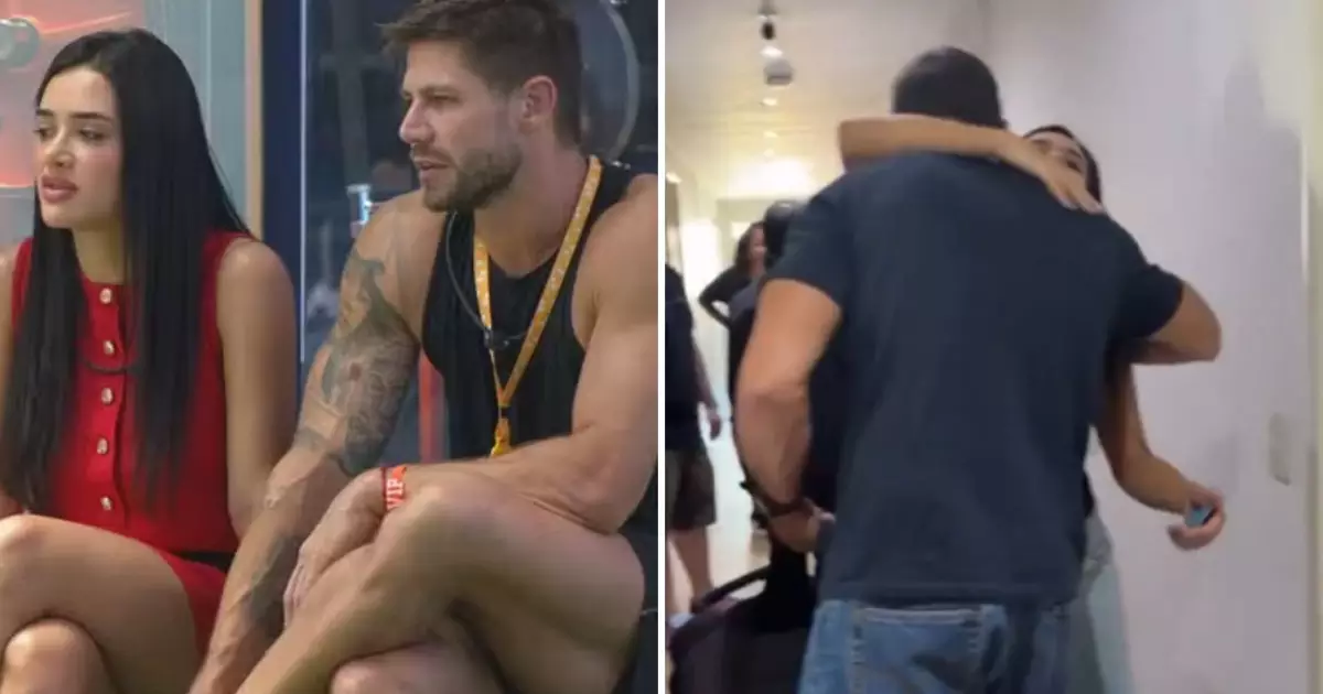 Jonas e Jordana abraçam-se no corredor do hotel