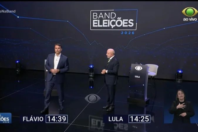Lula e Flávio Bolsonaro durante debate na Band