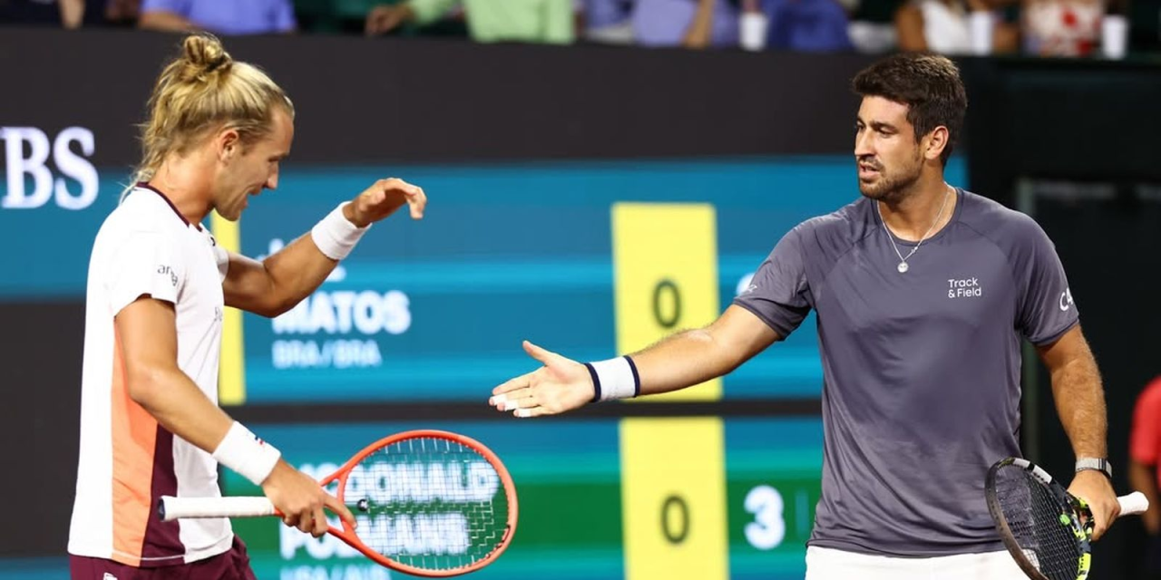 Rafael Matos e Orlando Luz durante partida de duplas