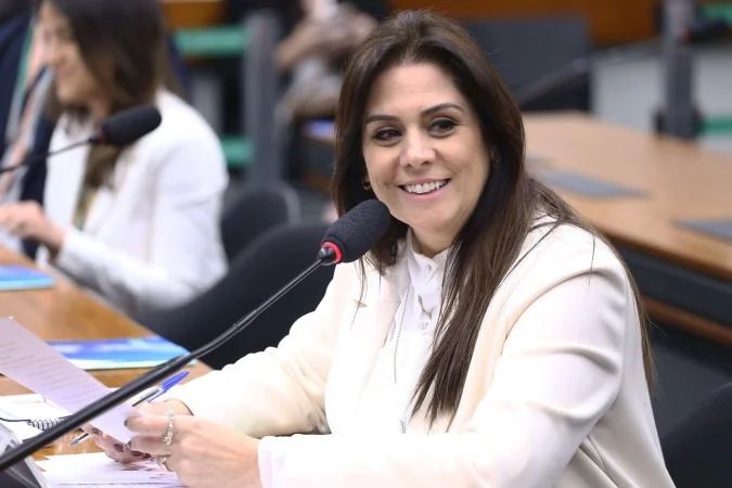 Simone Marquetto e Flávio Bolsonaro em evento político em Campinas