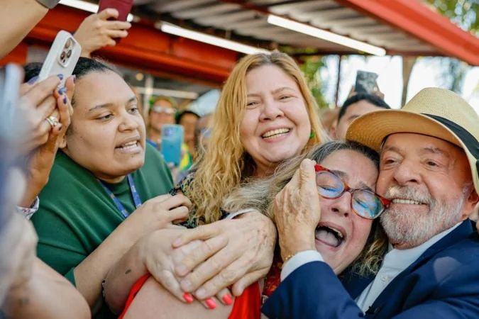 Lula e Flávio Bolsonaro em eventos de campanha